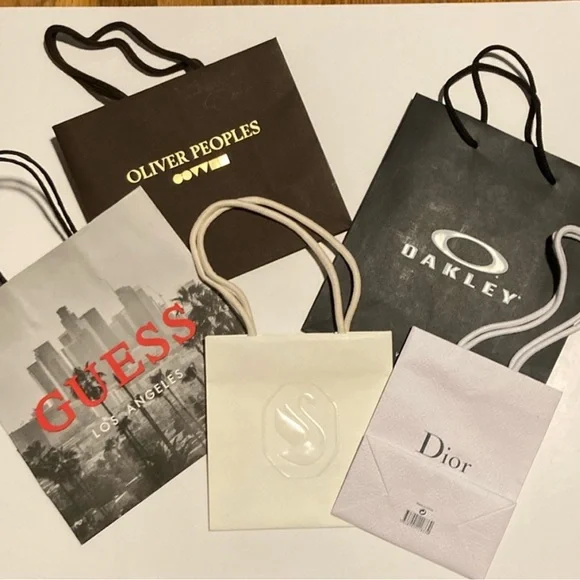 Dior, Swarovski, Oliver peoples, Oakley and Guess Gift Bags - Picture 1 of 9